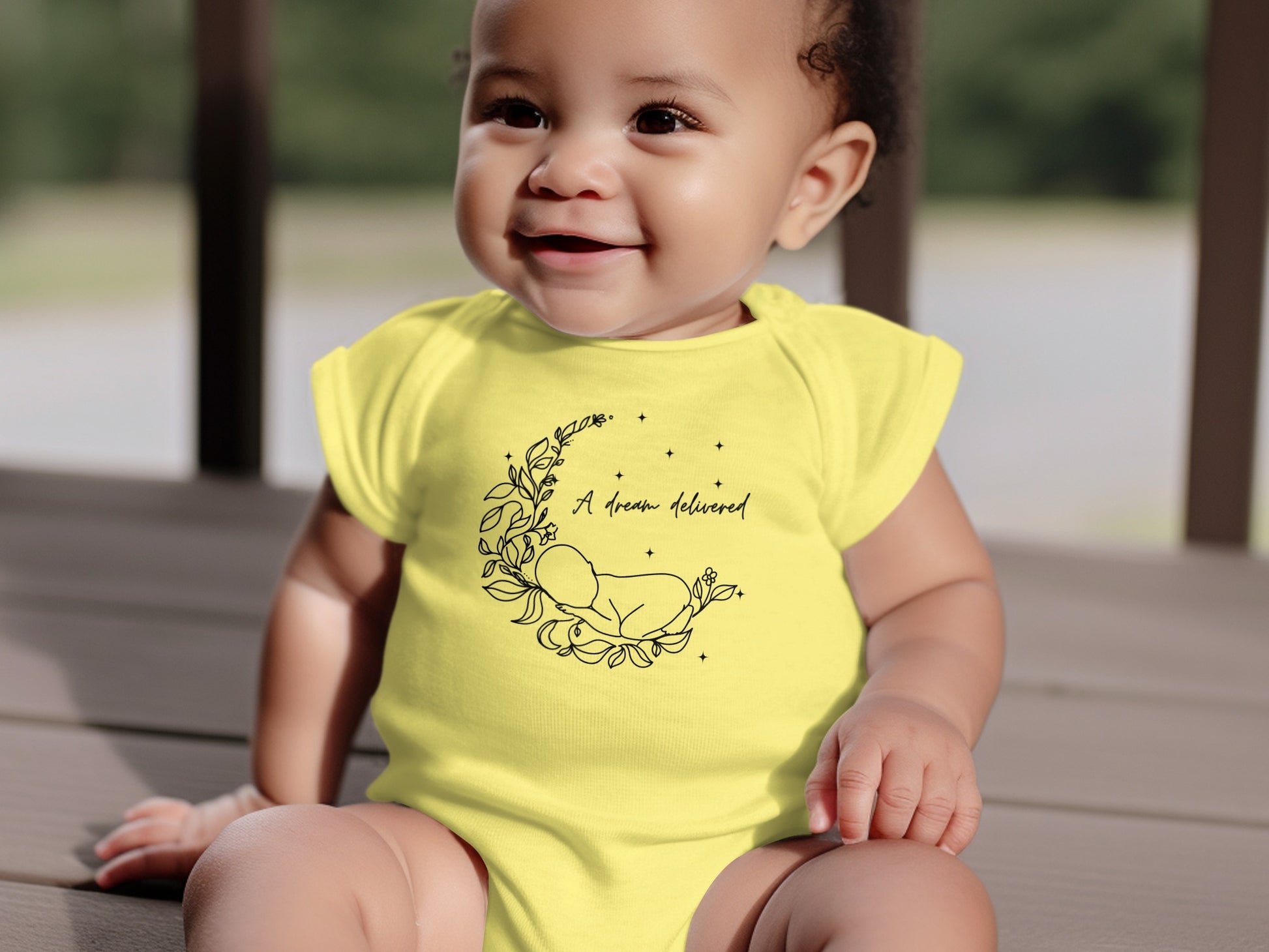 Adorable Yellow Baby Onesie with Sweet Sleeping Baby
