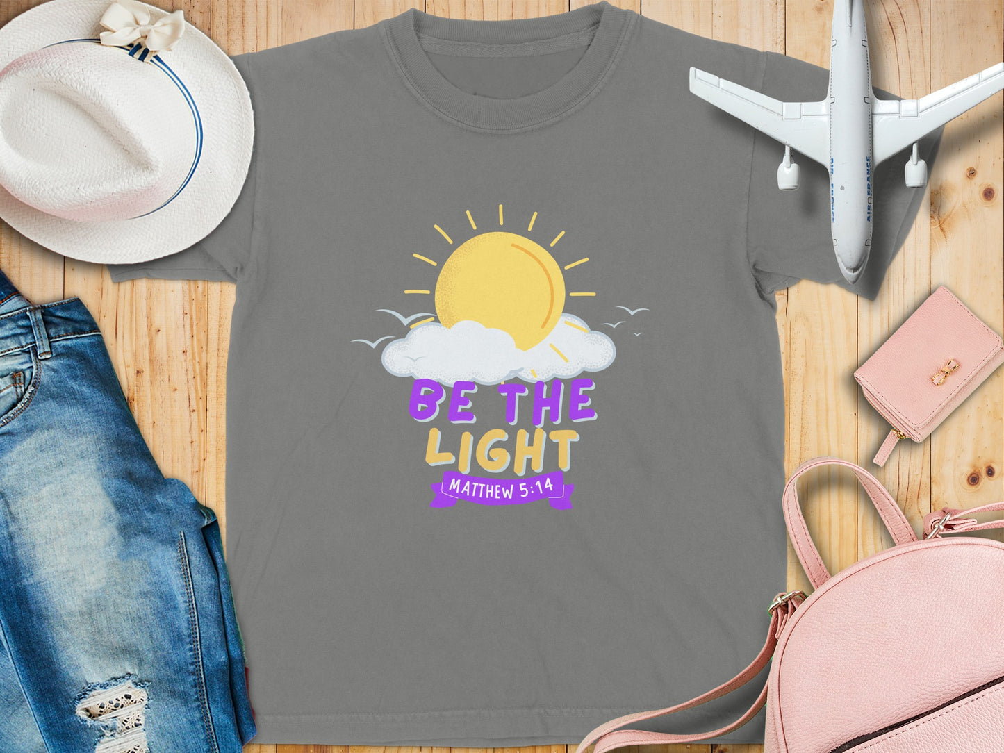 Be The Light Graphic Tee Shirt with Sun and Clouds