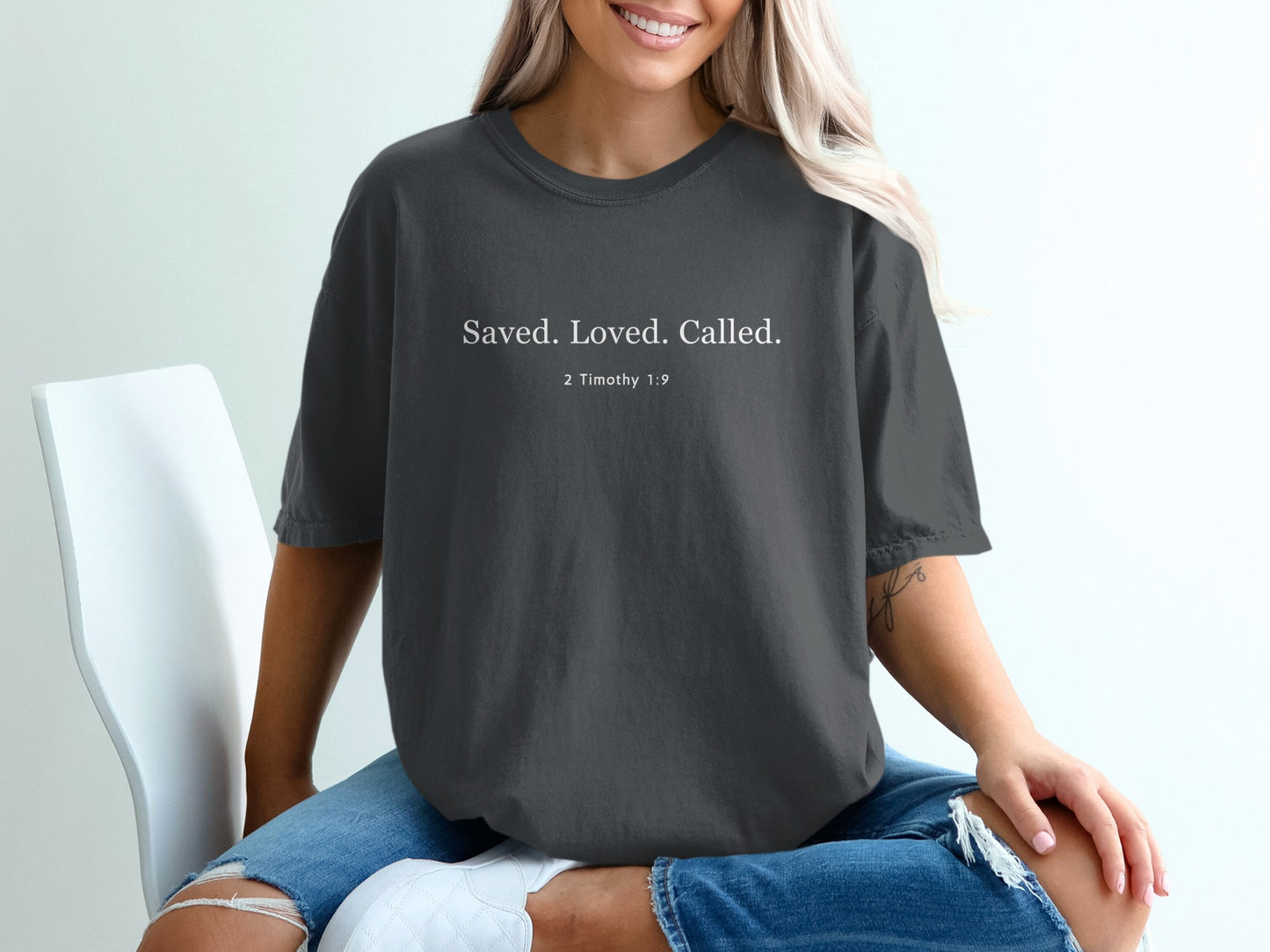 Saved Loved Called 2 Timothy 1:9 graphic t-shirt product
