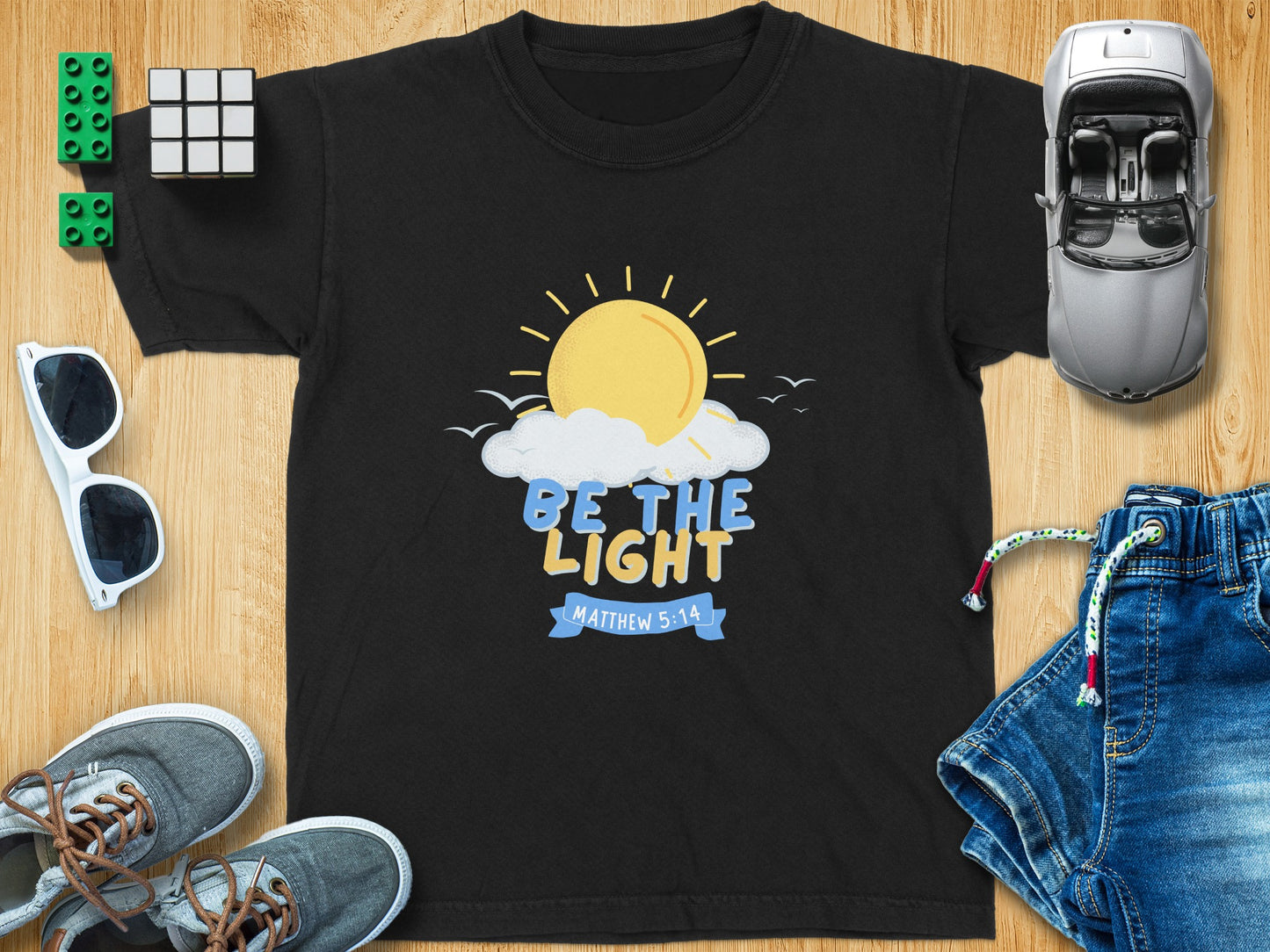 Be the Light Matthew 5:14 Graphic Tee Product